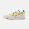 Reebok Classic Unisex CL LTHR GROW Baskets Basses Chalk/pride Yellow/horizon Blue