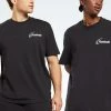 Reebok Classic GS ADVANCED MOTION UNISEX T Shirt Imprimé Black
